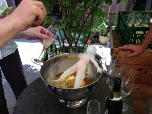 Sonja Alhäuser's work: a woman figure melts in champagne. The guests got the champagne.